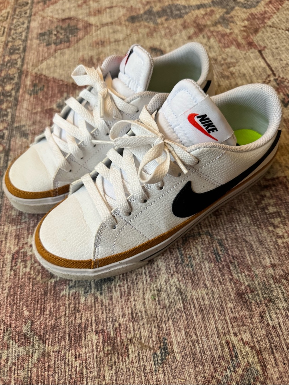 Nike Women’s White Sneakers with Black Swoosh and Tan Accent